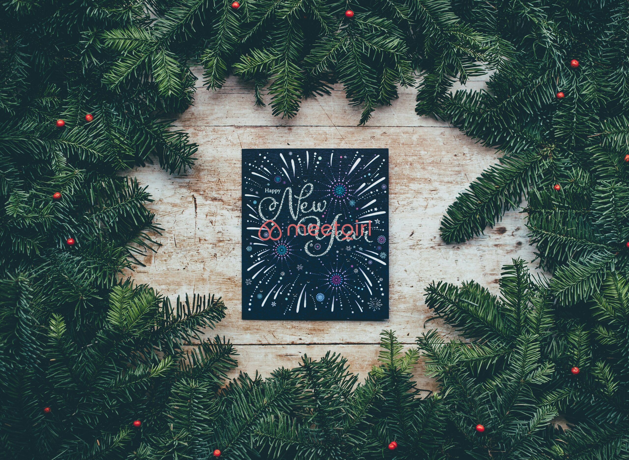 decoración navideña verde con felicitaciones de Año Nuevo